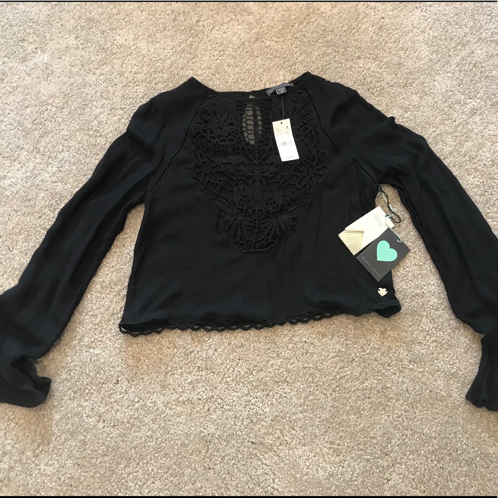 Kendall & Kylie blouse with lace accents.